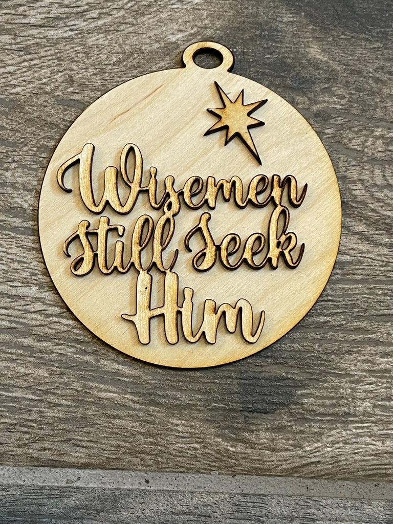 A DIY wooden Christmas tree ornament from Little August Ranch that says "wirmen still seek him.