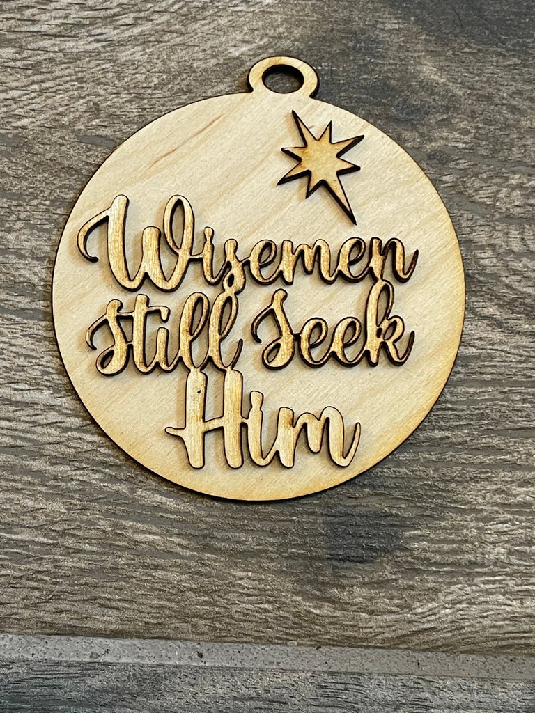 A DIY wooden Christmas tree ornament from Little August Ranch that says &quot;wirmen still seek him.