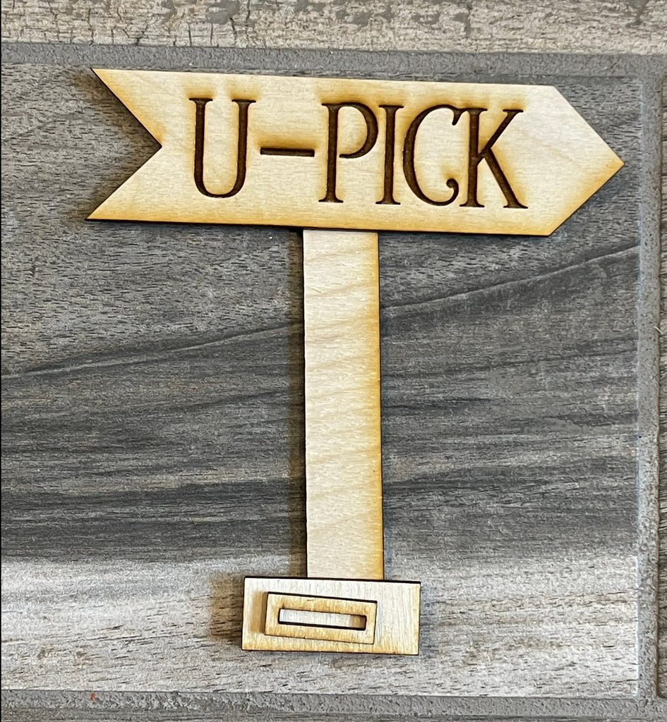 A DIY wooden sign with the word &quot;u pick&quot; on it, perfect for your Little August Ranch Watermelon Tiered Tray DIY Paint Kit - Farmers Market Wood Blanks - U-Pick- Summer Paint Kit project.