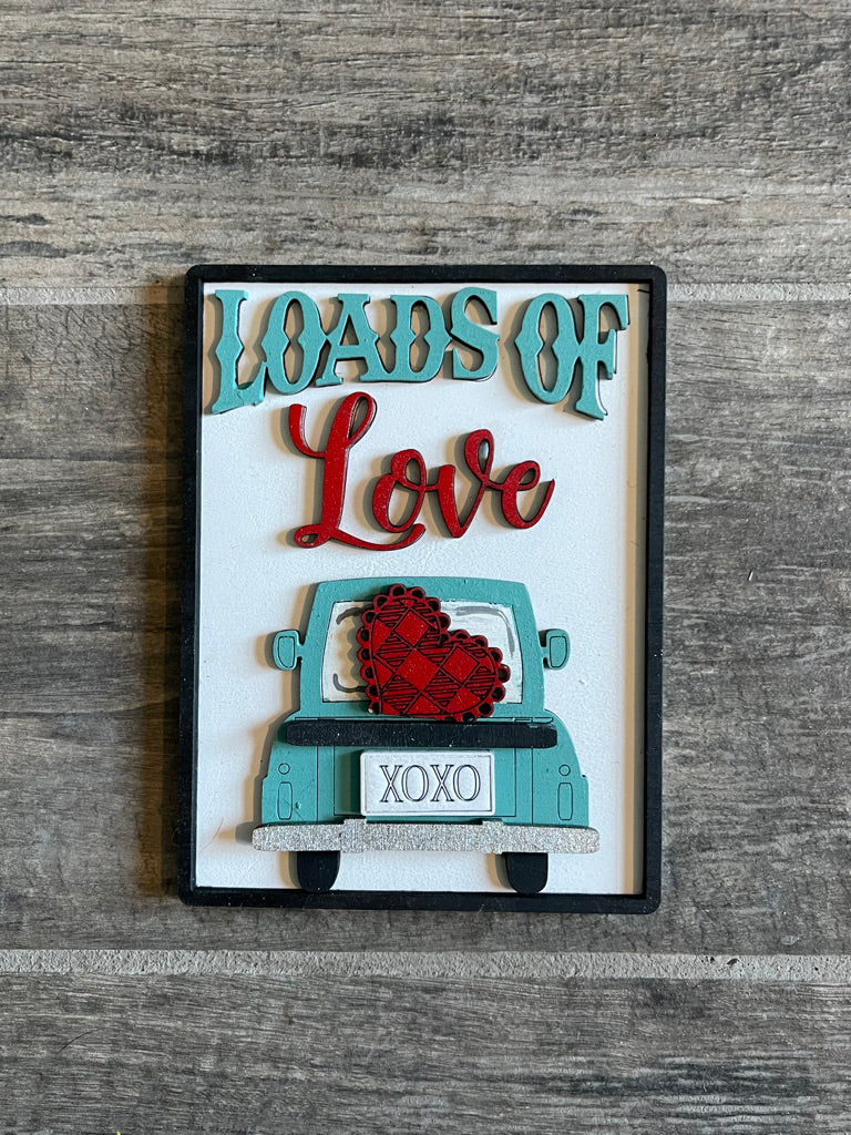 A Little August Ranch Valentine Tiered Tray Set - Finished Tray Bundle - Love Birds - Loads of Love - Love Shelf Decor sign with the words "Loads of Love" on it.