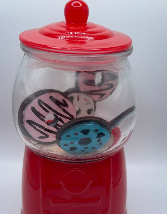 A Little August Ranch red Valentine Gumball Machine filled with Valentine candy.