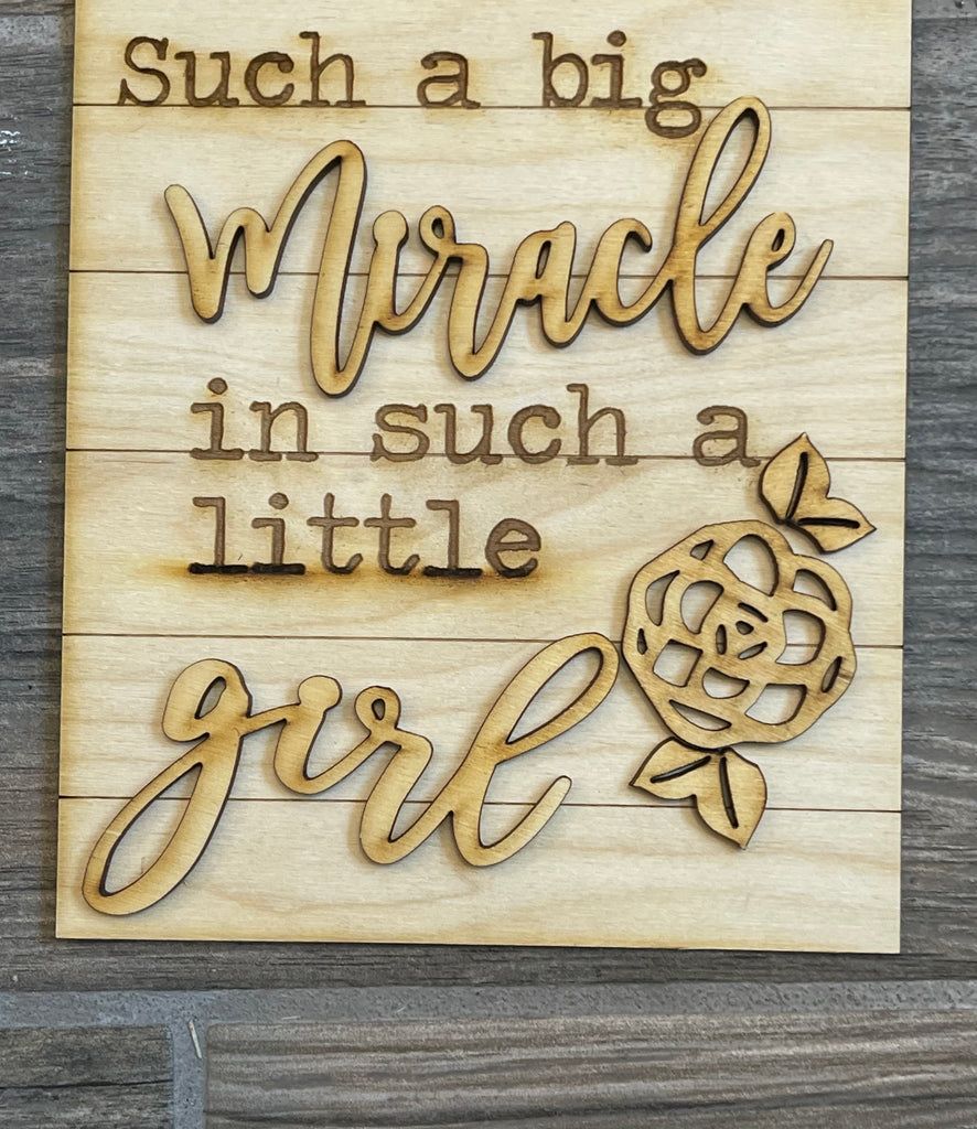 This little girl used Little August Ranch's Little Girls Tiered Tray DIY - Paint it Yourself to decorate wood pieces, creating a big miracle.
