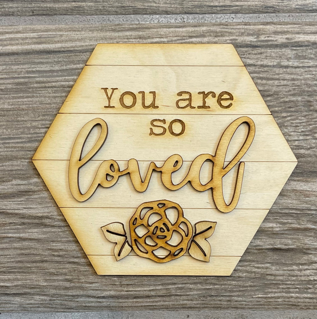 A Little August Ranch wooden sign that you can DIY paint and decorate with wood pieces to create a personalized display that says "you are so loved.