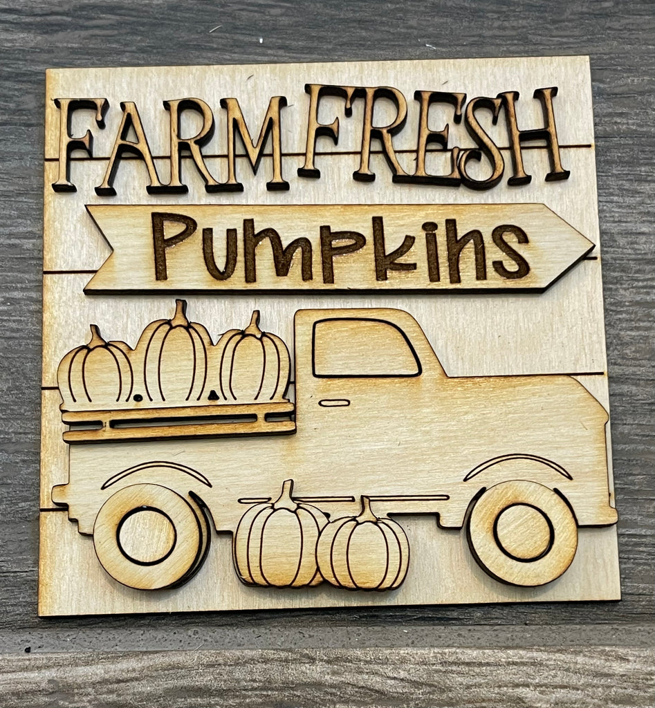 Wooden Fall Farm Square DIY Decor Kit from Little August Ranch for a sign with engraved and raised lettering reading "farm fresh pumpkins" and the image of a truck carrying pumpkins, perfect for tiered trays.