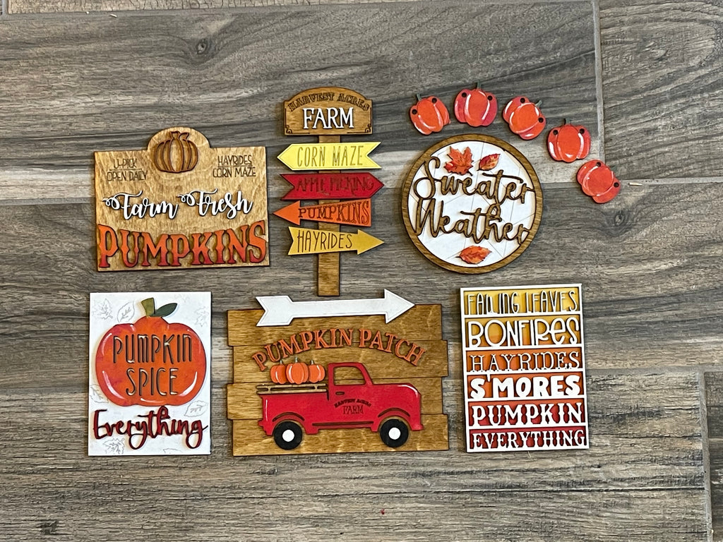A collection of DIY Fall Tiered Tray - Pumpkin Patch, Sweater Weather signs from Little August Ranch, perfect for DIY paint enthusiasts or those who love wood items.