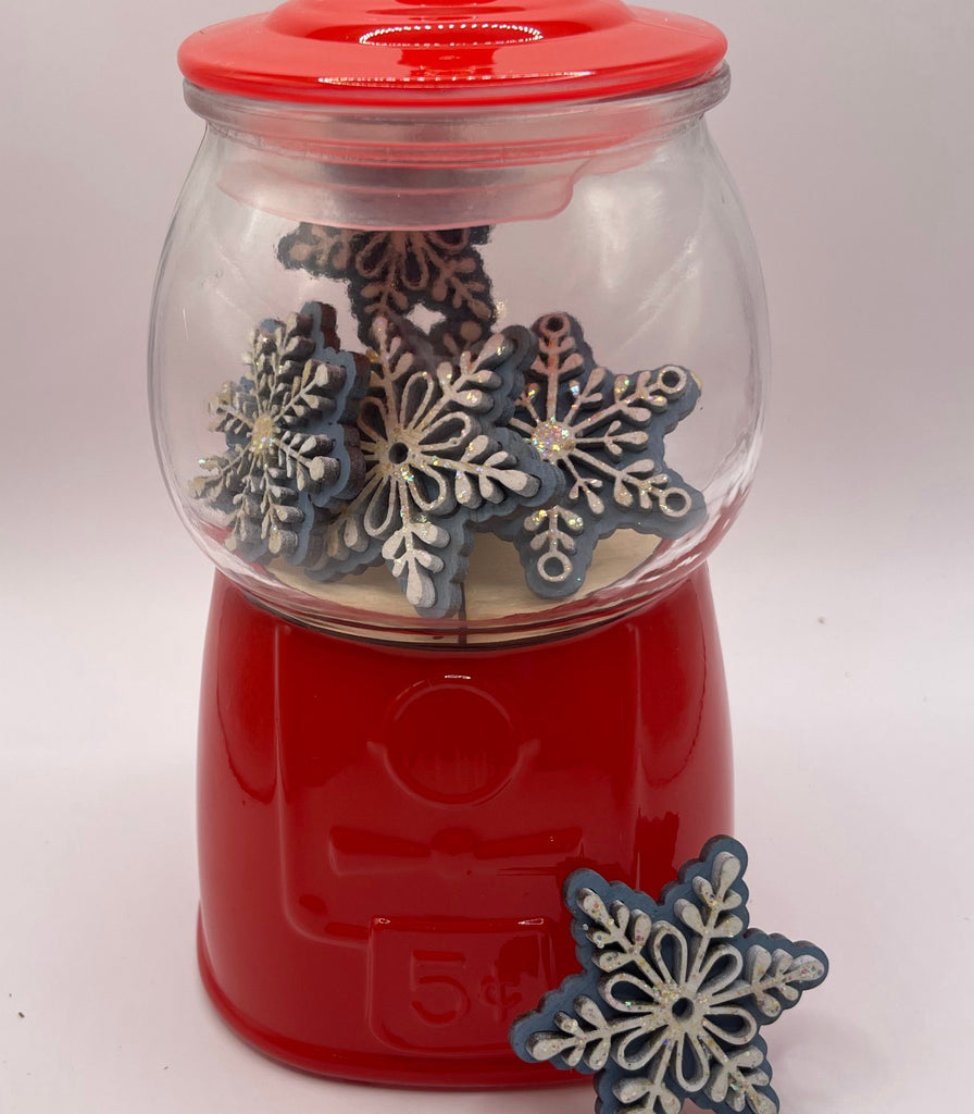 A red Winter Gumball Machine Filler - DIY Gumball Filler Craft Kit - Wood Blanks with snowflakes in it from Little August Ranch.