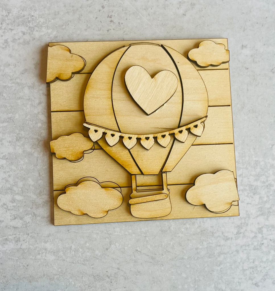 Love is in the Air with this Valentine Hot Air Balloon DIY Leaning Ladder Insert Kit - Interchangeable Valentine Decor - Love is in the Air DIY Wood Tile from Little August Ranch. Perfect for Valentine DIY projects or adding an enchanting touch to your Leaning Ladder Insert Kit.