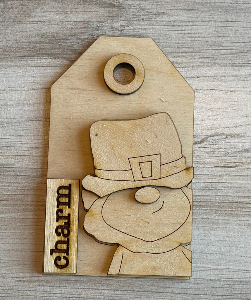 A DIY St Patrick's Day Tags featuring a leprechaun in a hat, perfect for Little August Ranch St Patrick Tree Ornament Wood Blanks or Saint Patrick Ornaments projects.