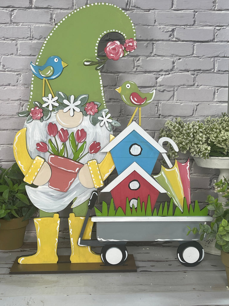 A Spring Gnome Shelf Decor DIY Paint Kit - Gnome Wood Blank made by Little August Ranch, with a wagon and birds, that you can DIY paint.