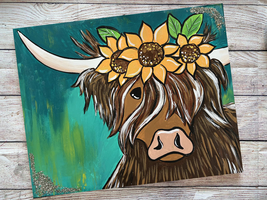 Experience a unique painting of the Highland Furry Cow adorned with sunflowers, created through the Little August Ranch LIVE Virtual Paint Party.