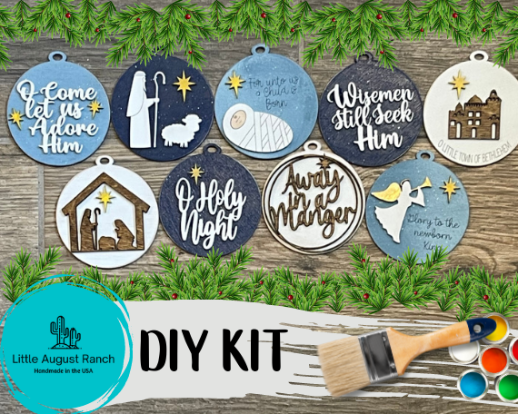 Little August Ranch DIY Nativity kit with a paint brush and paint.