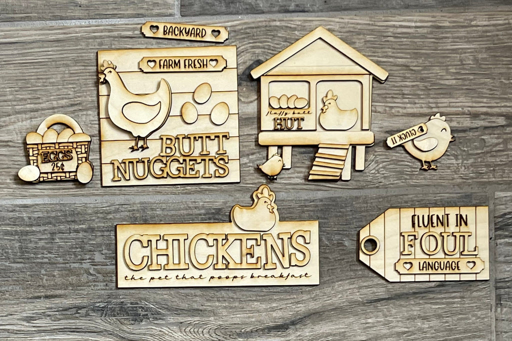 A set of Funny Chicken DIY Tiered Tray - Butt Nuggets signs from Little August Ranch, perfect for a chicken farm-themed tiered tray.