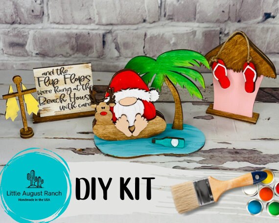 A group of Beach Santa DIY Craft Tiered Tray Kit - Christmas Beach Tiered Tray Bundle crafts by Little August Ranch.
