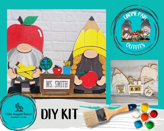A DIY kit with School Freestanding Wood Gnome Outfits- Teacher Interchangeable Gnomes, apples, and a paintbrush from Little August Ranch.
